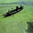 Workers try to clear blue-green algae from Dianchi lake