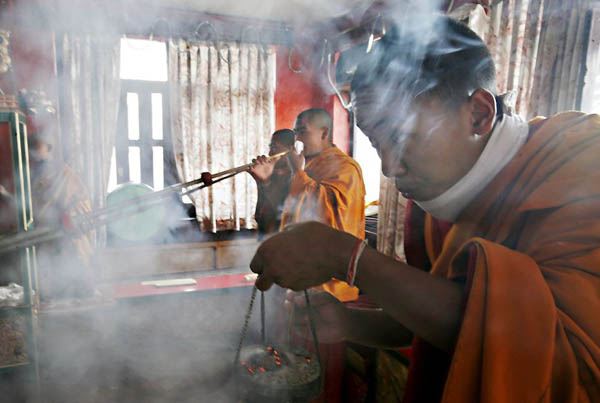 Katmandu, Nepal: Buddhist monks perform a prayer service
