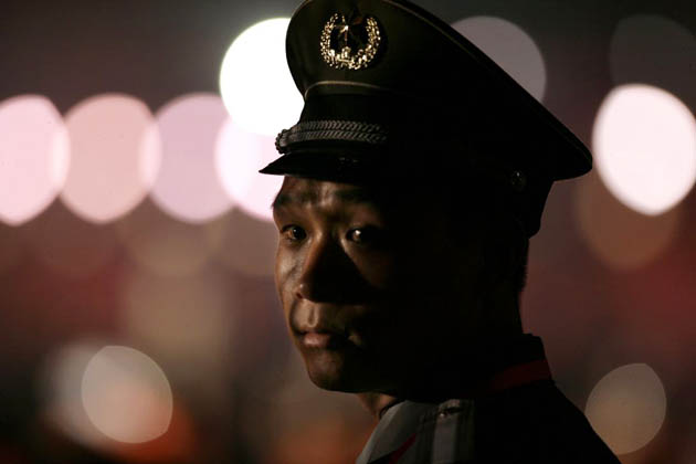 security guards seen during the 100 Days Countdown celebration to the Beijing Summer Olympics