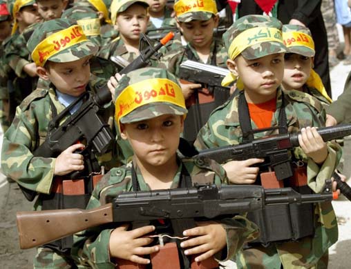 Boys dressed as soldiers