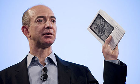 Amazon CEO Jeff Bezos brandishes new 'Kindle' ebook