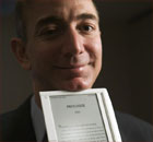 Jeff Bezos and a Kindle electronic reader