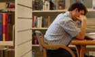 A student studying in the library at Coventry University