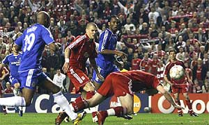 John Arne Riise scores an own goal