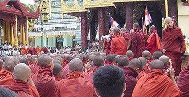 Buddhist monks gather to protest in Rangoon