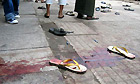 Blood seen in a street in Rangoon, Burma