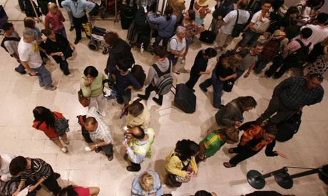 Passengers in line at Heathrow airport