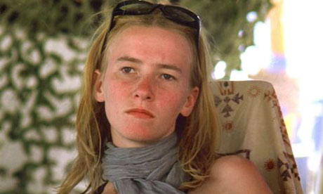 Peace activist Rachel Corrie is shown at the Burning Man festival  in a photo from September 2002, in Black Rock City, Nevada