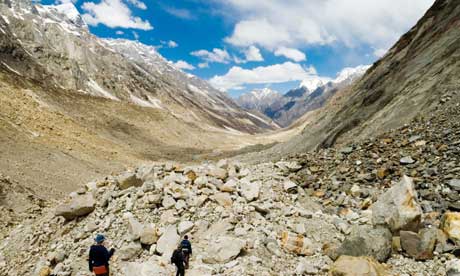 Trekkers crossing Gangotri glacier in Indian Haimalayas