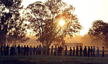 Hundreds of Zimbabwean wait in a voting queue on election day in Harare