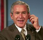 President George Bush. Photograph: Paul J Richards/AFP/Getty Images