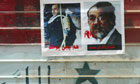 Images of Iraqi prime minister Nouri al-Maliki with a noose around his neck and half his face metamorphosing into Saddam Hussein in Sadr City