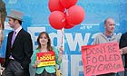 Labour supporters dressed as 'Tory Toffs' stand outside the office of Conservative candidate Edward Timpson in Crewe, Cheshire