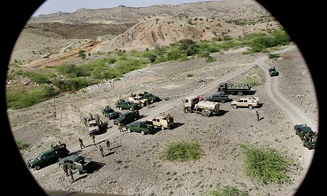 Pakistani soldiers seen from a departing helicopter in Spinkai, a town that has been the scene of fierce fighting between the Pakistani army and Taliban militants