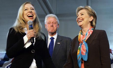 Hillary Clinton campaigns in Sioux Falls, South Dakota, with daughter Chelsea and husband Bill. Photograph: Elise Amendola/AP