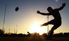 Daniel Carter practices his kicking during a New Zealand All Blacks training session in Christchurch