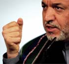Afghan President Hamid Karzai speaks during a press conference at 10 Downing Street, London, July 19, 2005