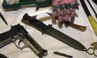 Guns, knives, and other weapons on display in London
