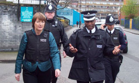 Harriet Harman wearing a 'stab vest' in Peckham, south London. Photograph: South London Press