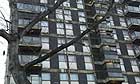 Regeneration: A block of flats, high-rise housing in poor condition in Whitechapel, London 