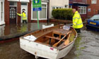 Doncaster council workers delivery food by boat during last year's floods