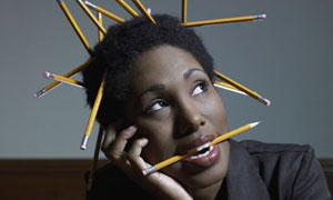 Bored at work office work weaves pencils in hair