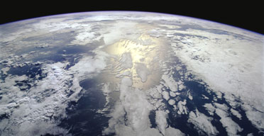WARNING: Image embedded by poster. ‘A view of the Earth from the space shuttle Endeavour shows sunshine reflected off an oceanA view of the Earth from the space shuttle Endeavour shows sunshine reflected off an ocean’