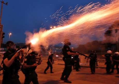 Turkish riot police fire tear gas to disperse protestors near Taksim Square in Istanbul. More than 2,300 people have been injured and one person killed during four days of fierce clashes between protesters and police in Turkey, according to a doctors' association, as the prime minister blamed 'extremist elements' for the riots.
